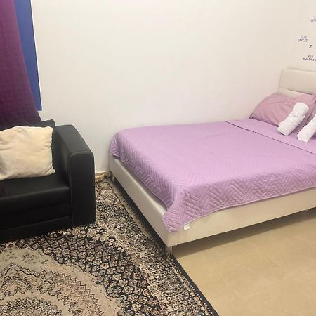 The Purple Place Apartment อาบูดาบี ภายนอก รูปภาพ