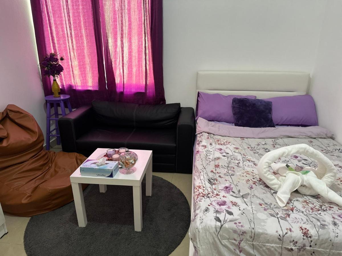 The Purple Place Apartment อาบูดาบี ภายนอก รูปภาพ