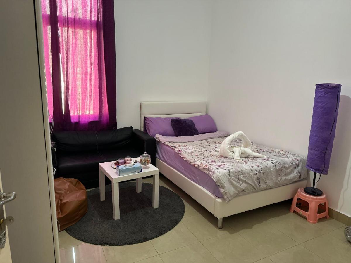 The Purple Place Apartment อาบูดาบี ภายนอก รูปภาพ