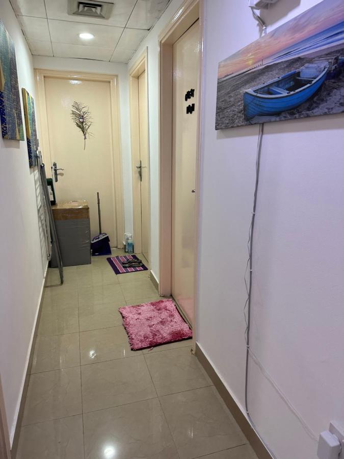The Purple Place Apartment อาบูดาบี ภายนอก รูปภาพ