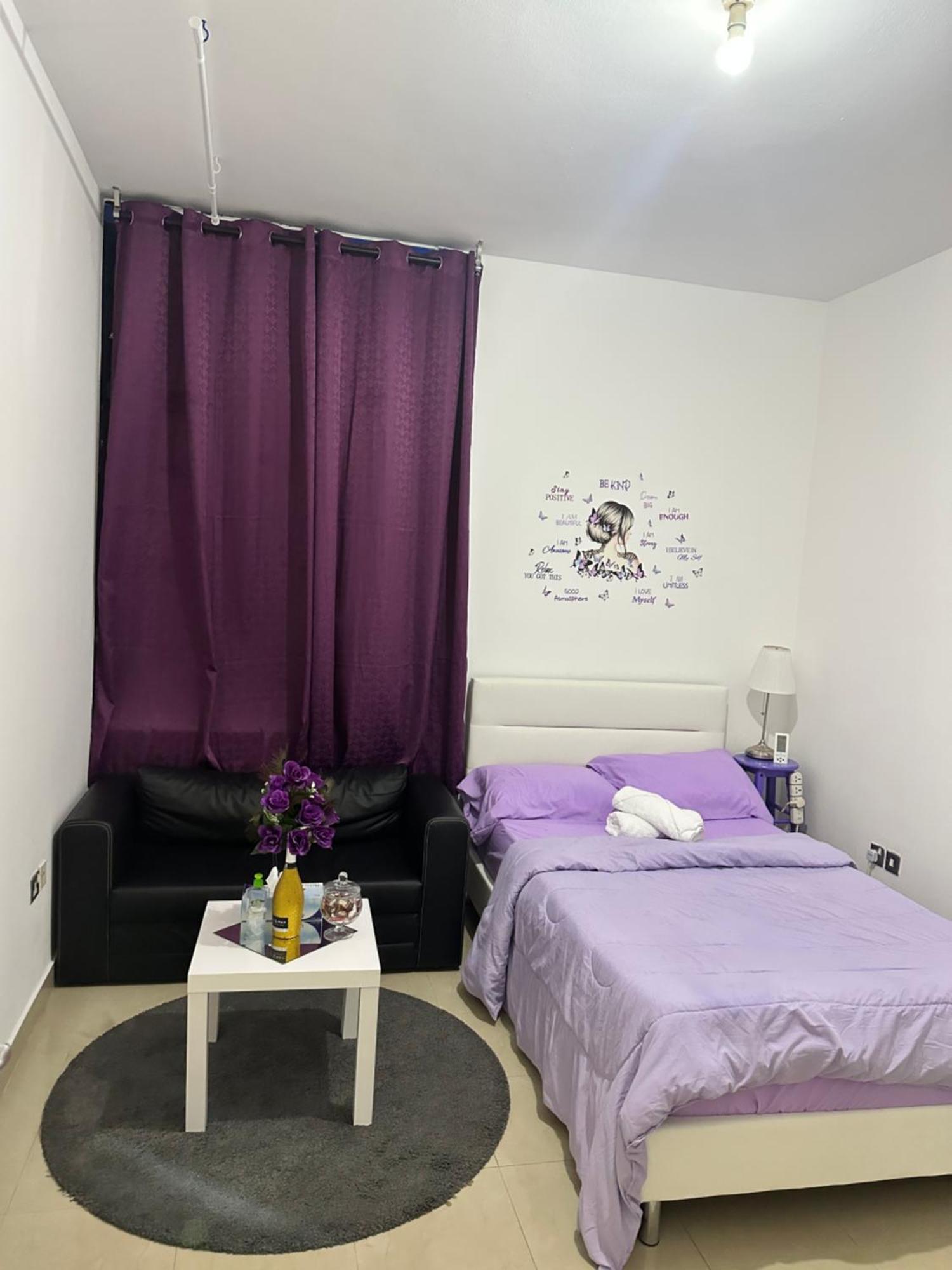The Purple Place Apartment อาบูดาบี ภายนอก รูปภาพ