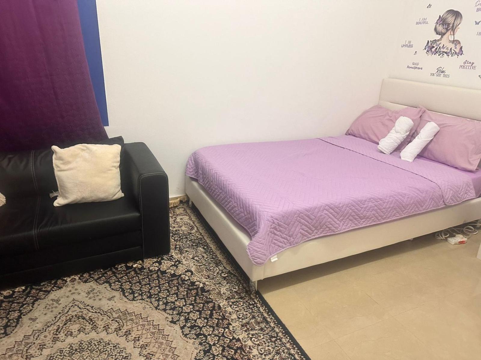 The Purple Place Apartment อาบูดาบี ภายนอก รูปภาพ