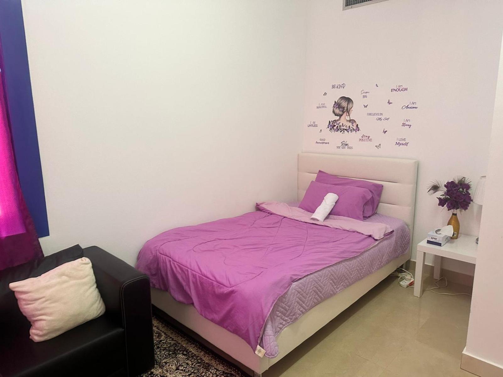 The Purple Place Apartment อาบูดาบี ภายนอก รูปภาพ