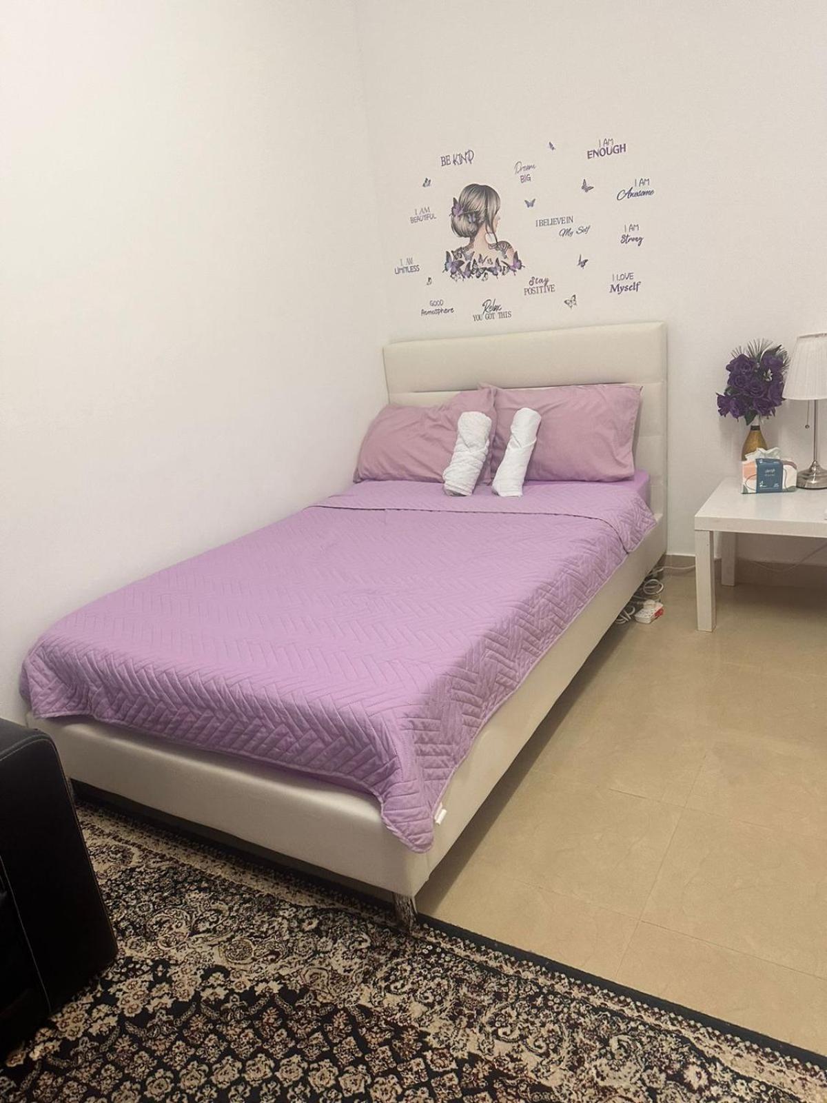 The Purple Place Apartment อาบูดาบี ภายนอก รูปภาพ